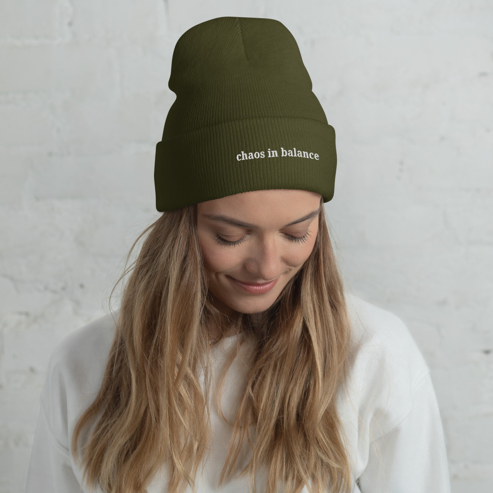 Chaos in Balance embroidered beanie by Nyxhera Creations, olive knit hat with white front embroidery