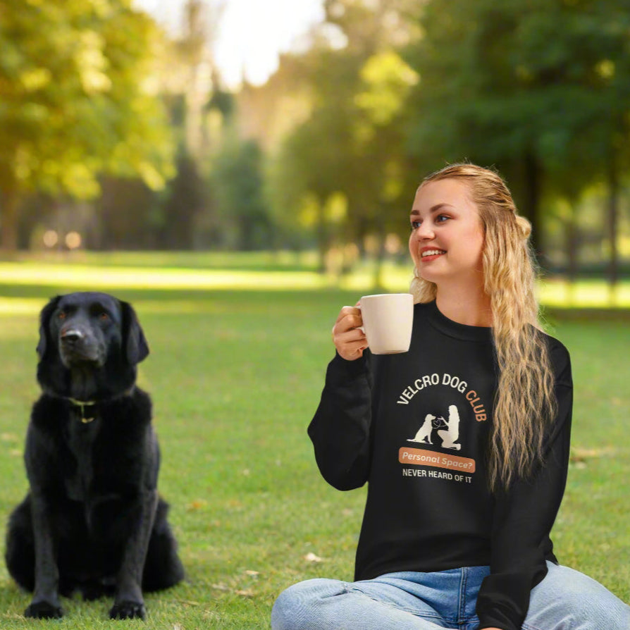 Dog mom wearing Velcro Dogs Club Gildan sweatshirt with her pup — cosy dog themed clothing