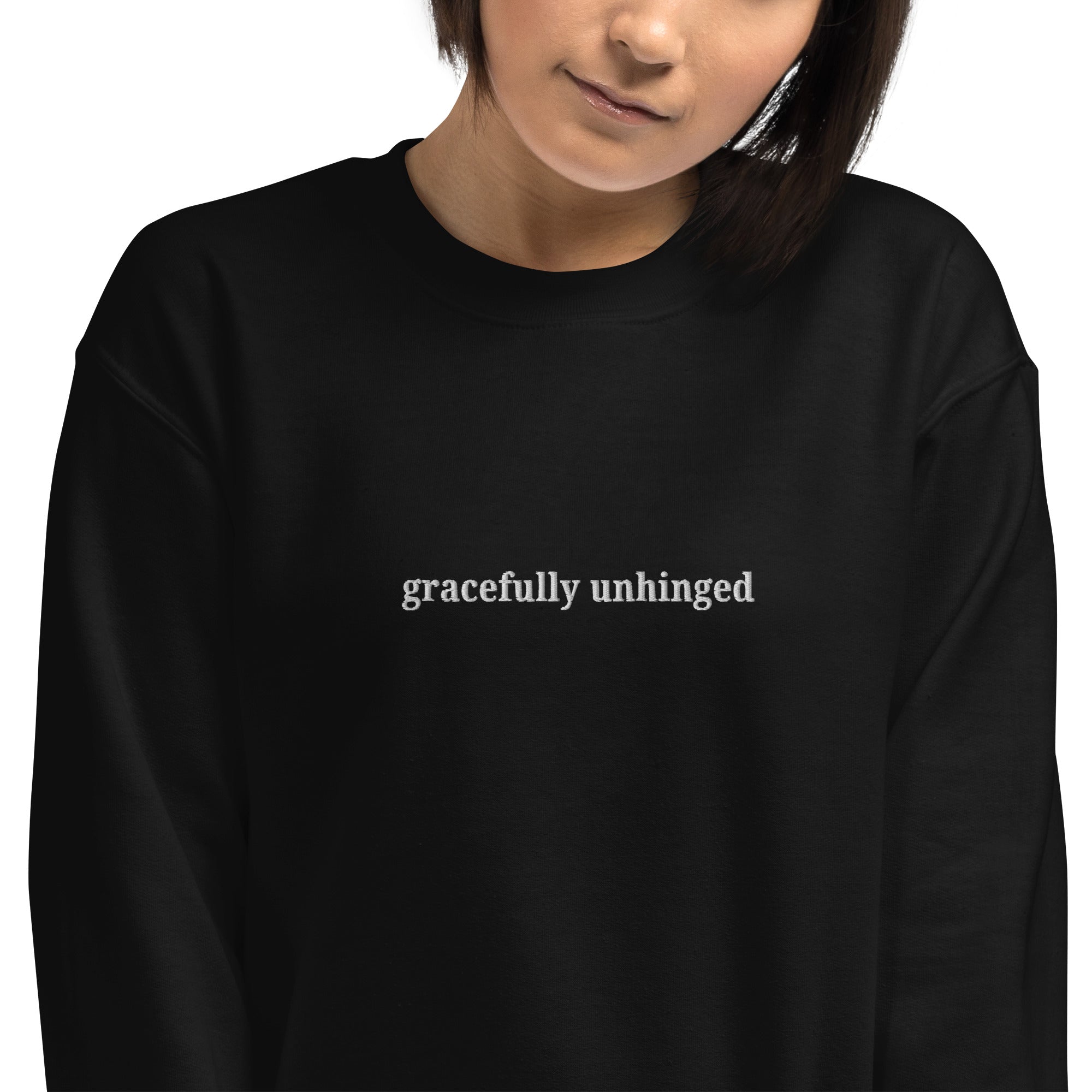 Gracefully Unhinged embroidered sweatshirt by Nyxhera Creations, black Gildan crewneck with white thread chest embroidery