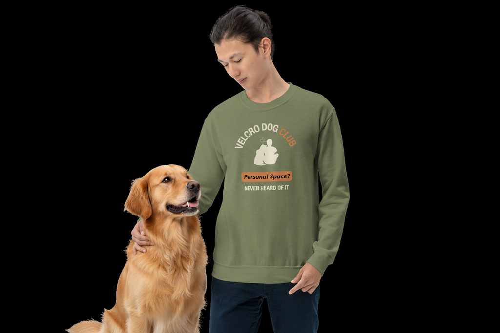 Person wearing a green sweatshirt with a graphic design on a white background