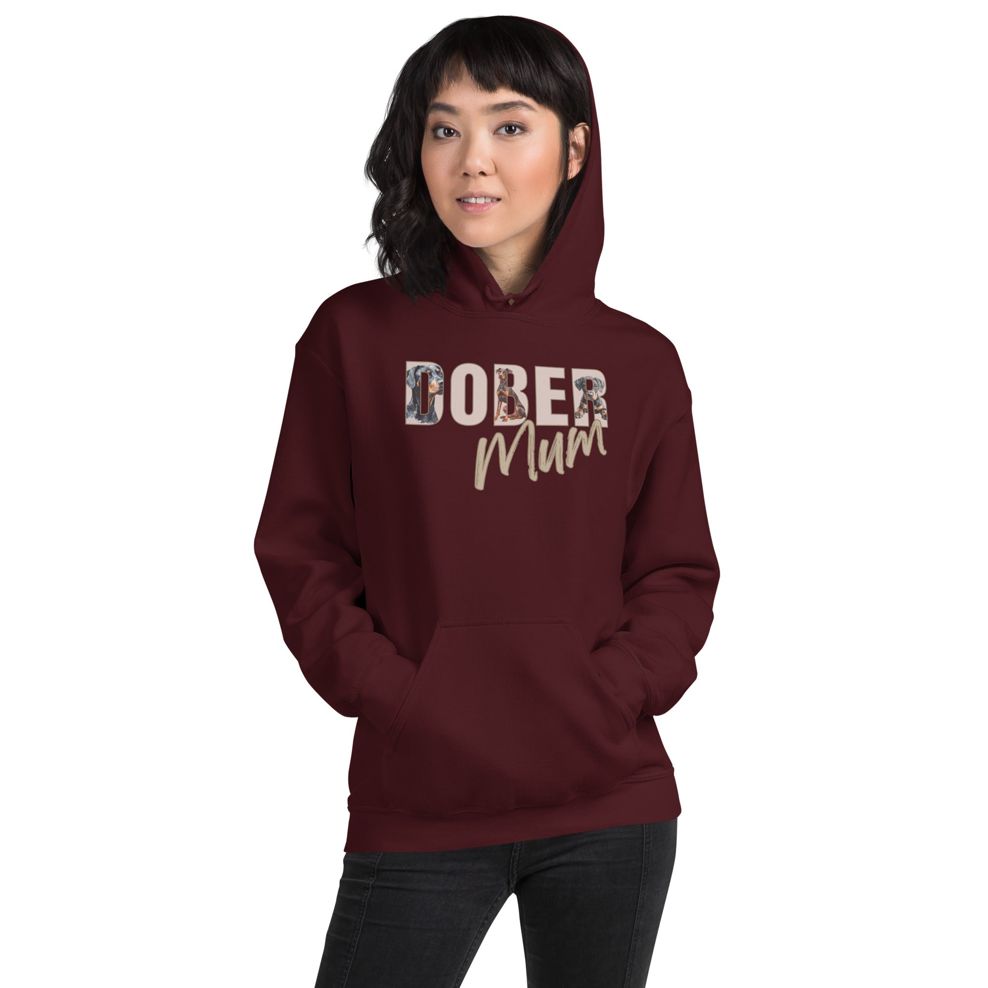 Person wearing a maroon hoodie with 'DOBER Mum' text on a white background