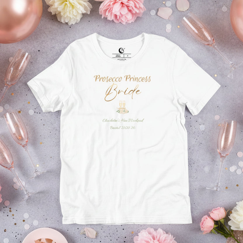 Personalised prosecco bride t-shirt in white with metallic-effect text and sage green accent details.