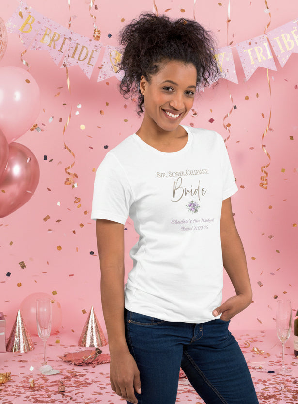 White bride t-shirt with “Sip, Sober, Celebrate” metallic-effect text and floral detail, styled for a sober hen celebration.