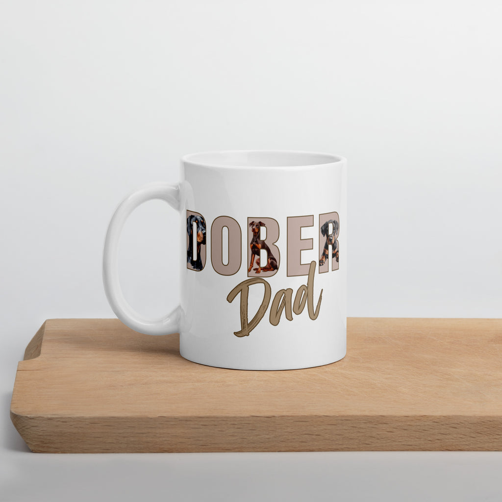 Close-up of Doberman illustrations in “Dober Dad” text on 11oz ceramic mug