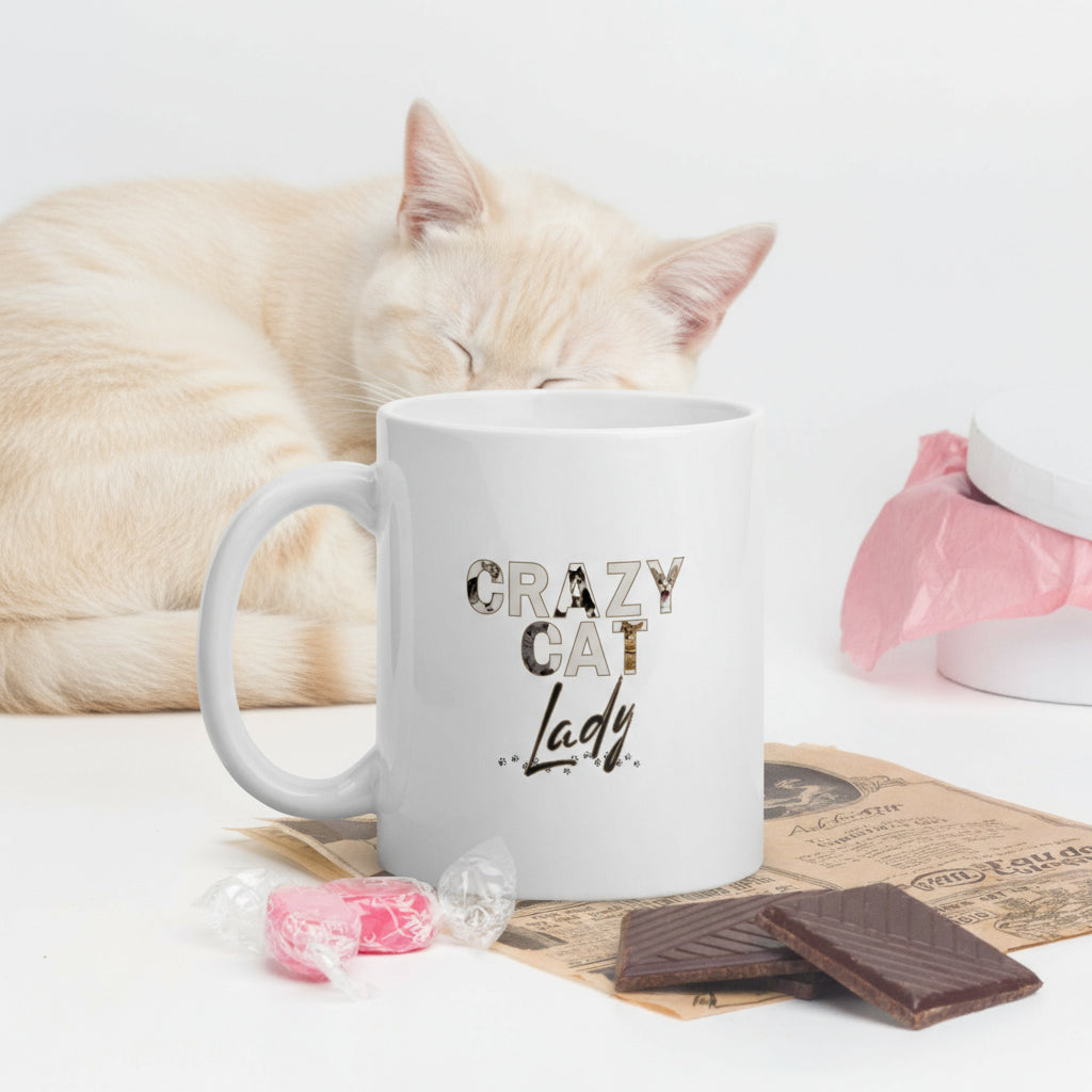 White 11oz ceramic mug with ‘CRAZY CAT’ letters illustrated with playful cat designs