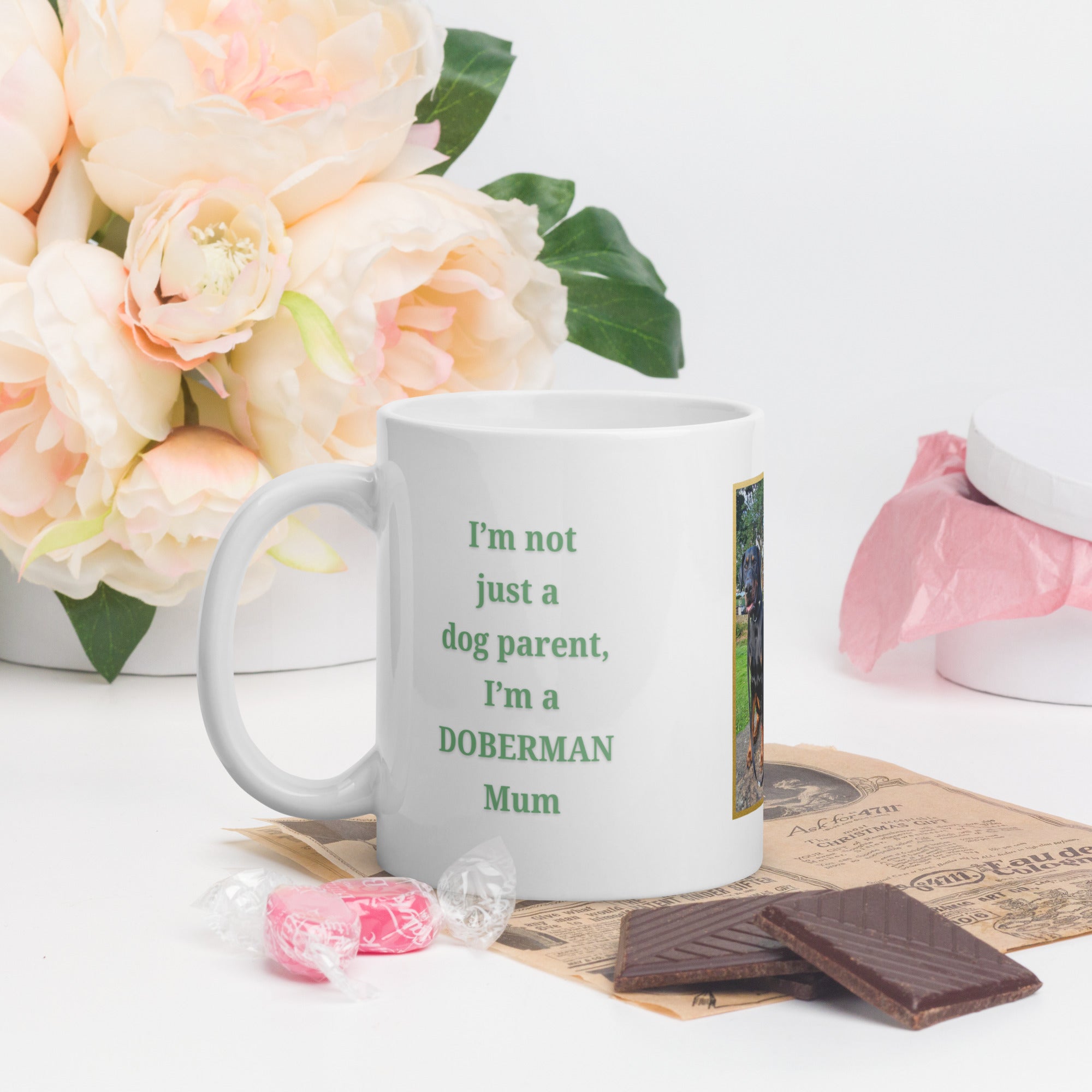 White ceramic mug with green “Dog Mum” text, a personalised dog photo framed with a gold border, and the dog’s breed name