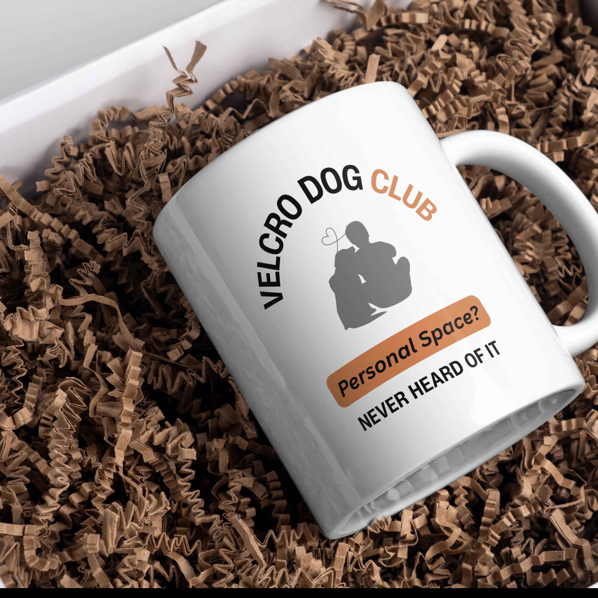 Close-up of Velcro Dog Club design on 11oz ceramic coffee mug