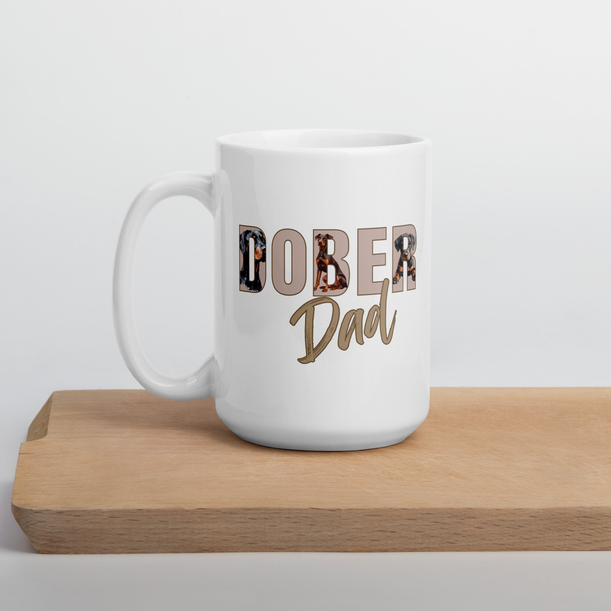 Close-up of Doberman illustrations in “Dober Dad” text on 15oz ceramic mug