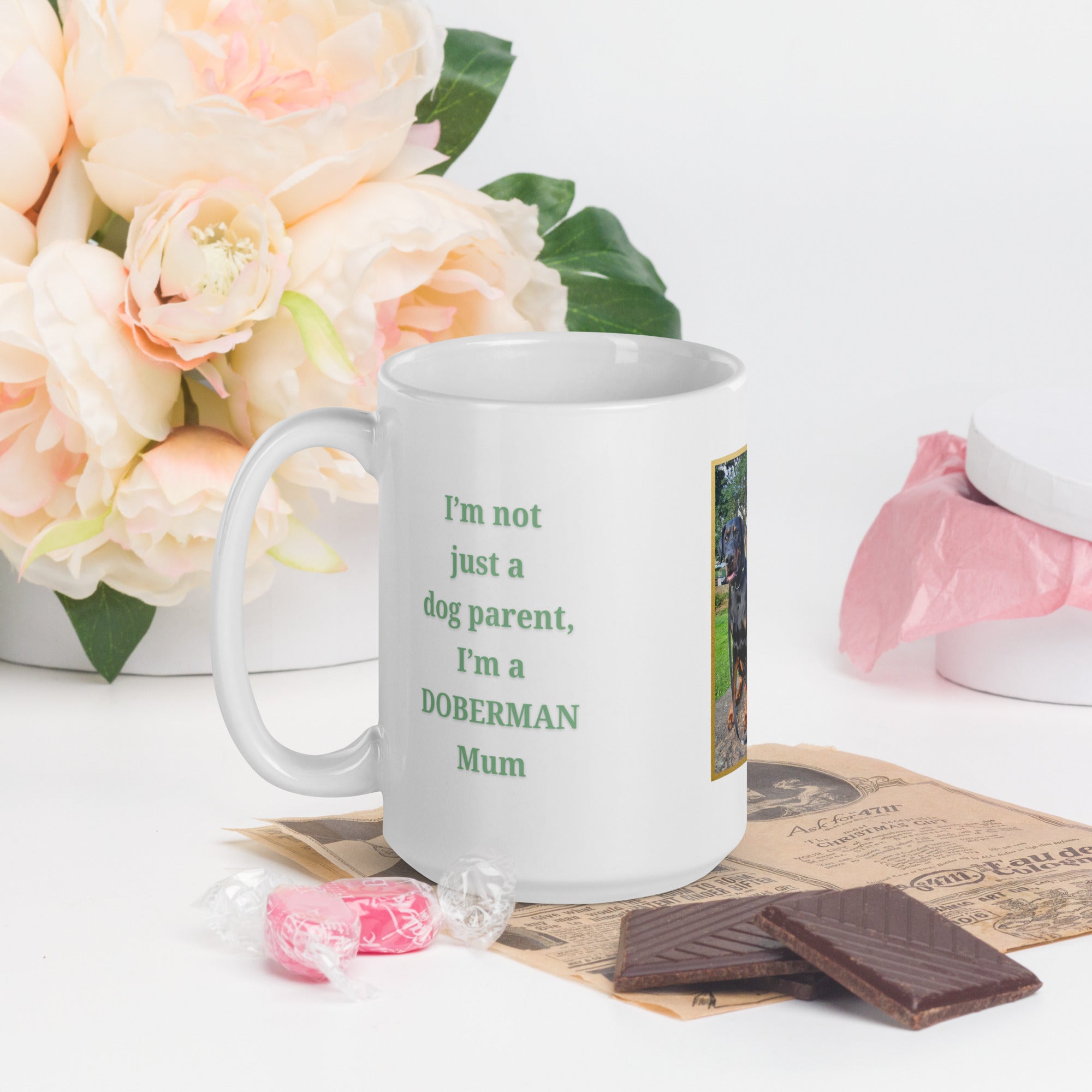 White ceramic mug with green “Dog Mum” text, a personalised dog photo framed with a gold border, and the dog’s breed
