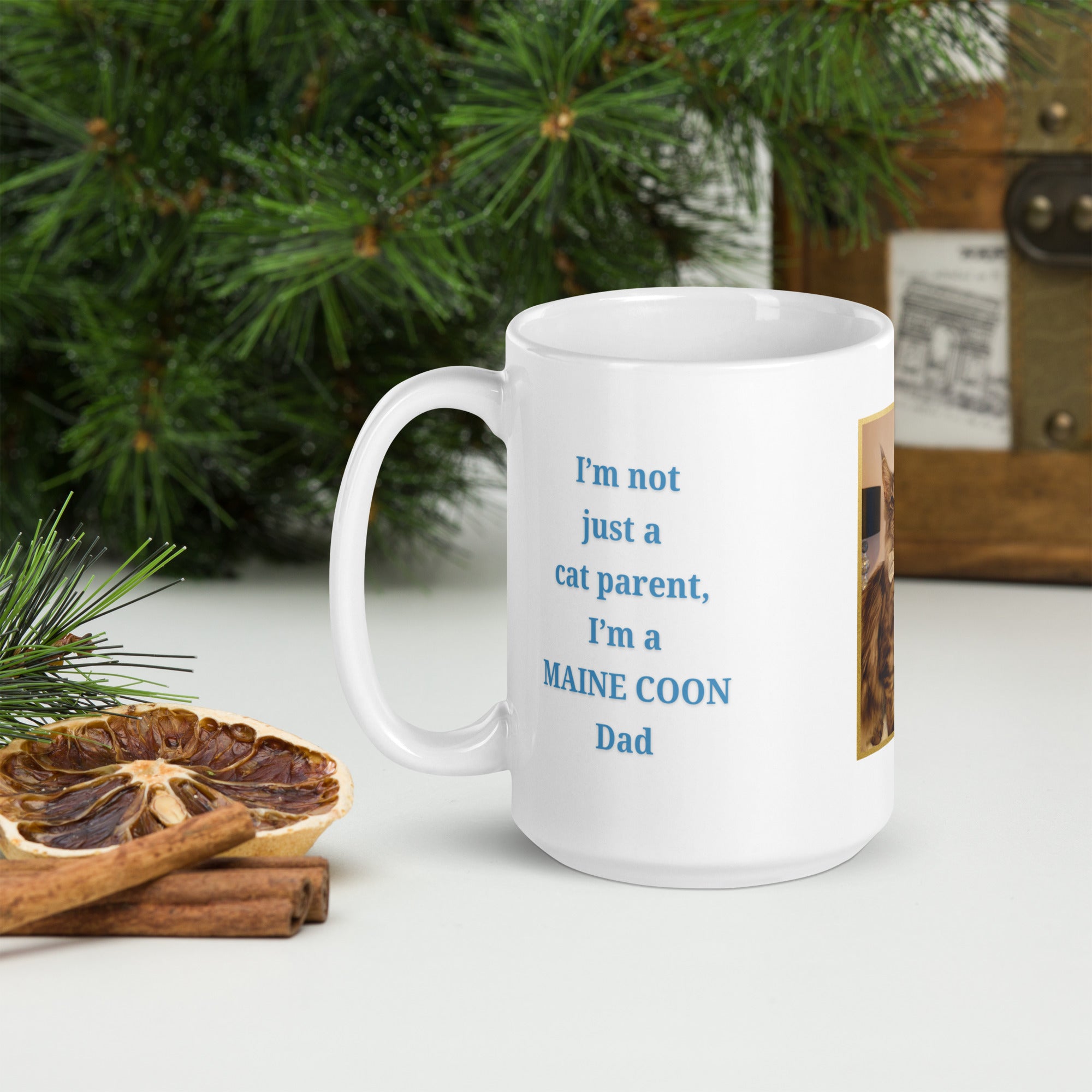 White mug featuring blue “Cat Dad” text, a custom cat photo framed in gold, and the personalised cat breed name