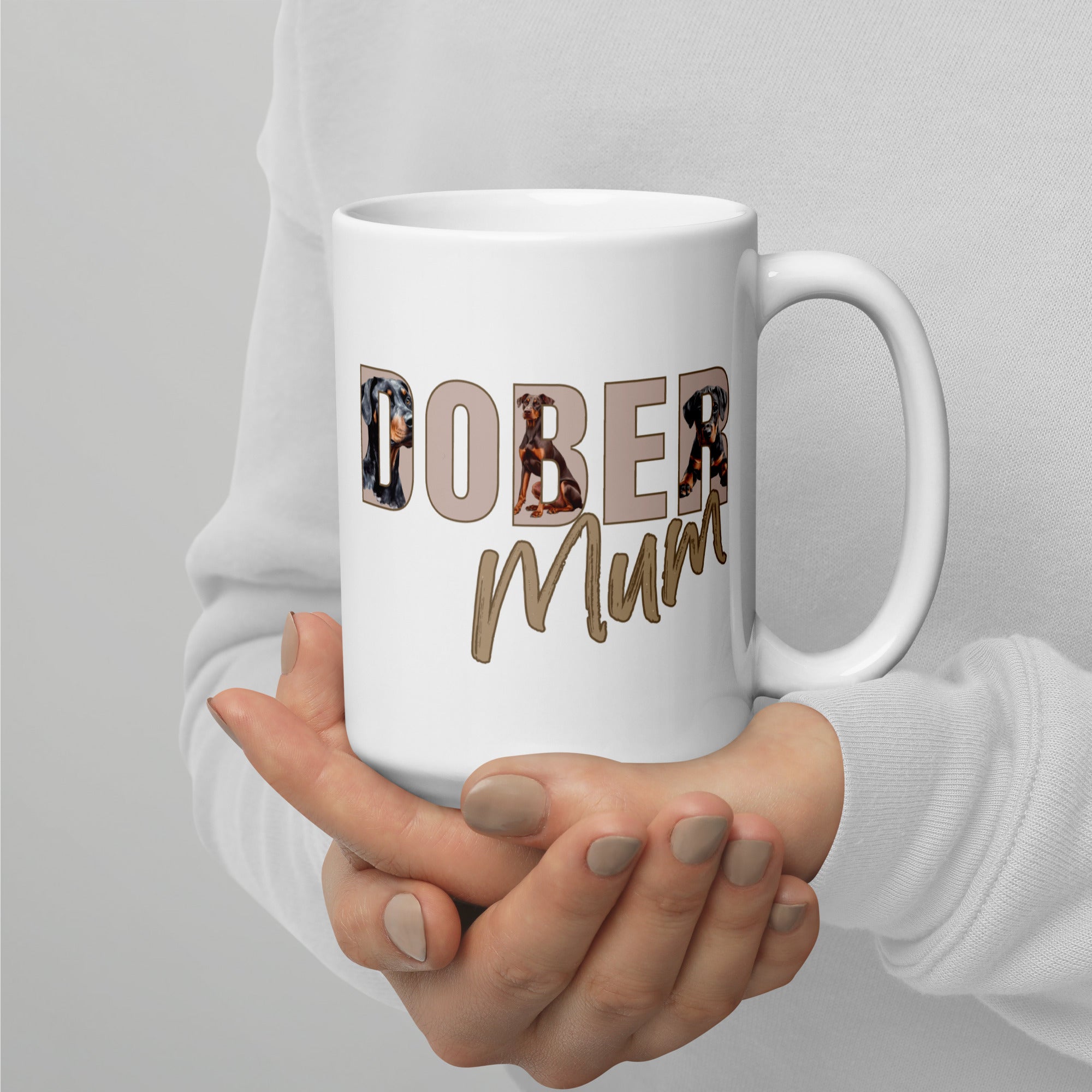 Close-up of Doberman illustrations in “Dober Mum” text on ceramic mug