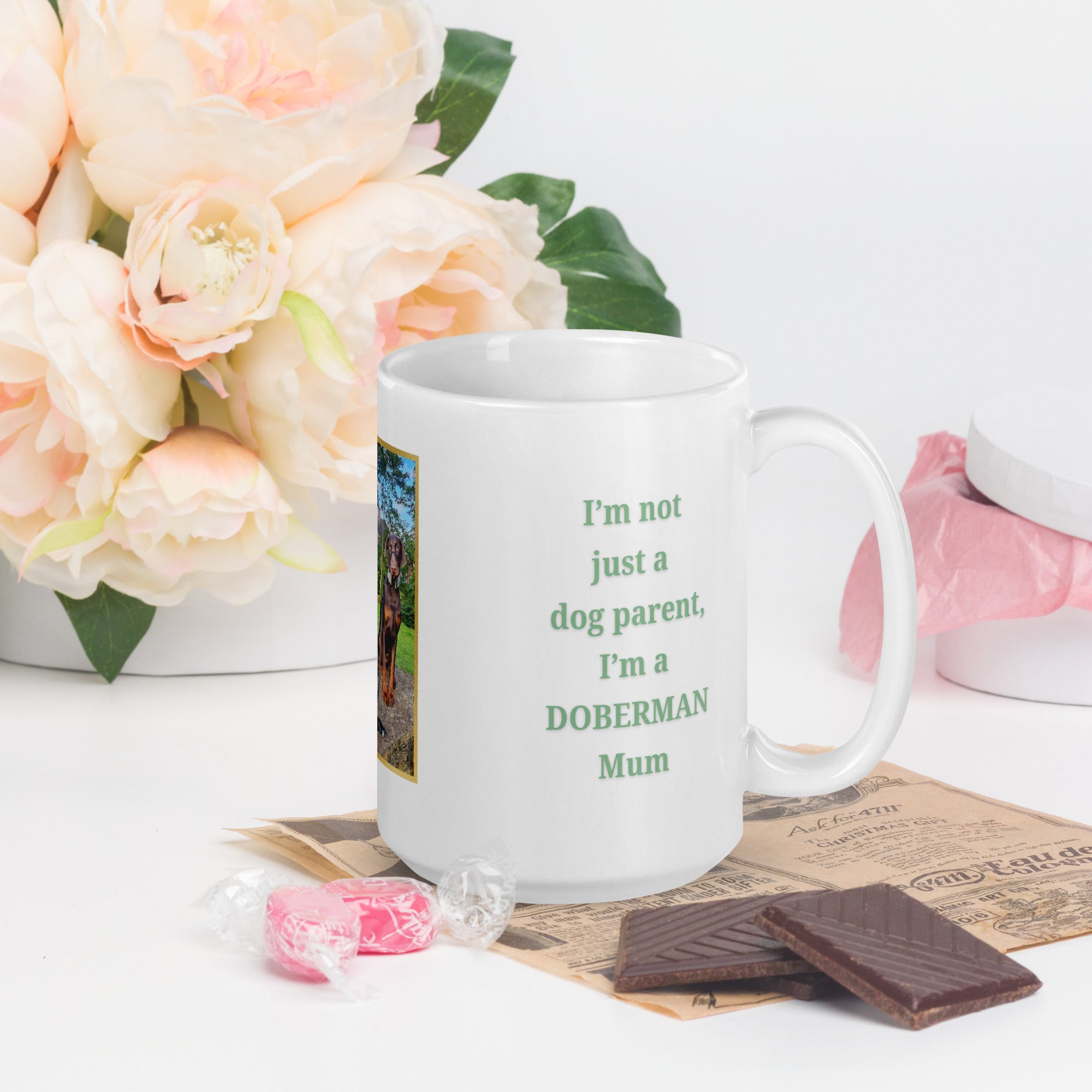 White ceramic mug with green “Dog Mum” text, a personalised dog photo framed with a gold border, and the dog’s breed