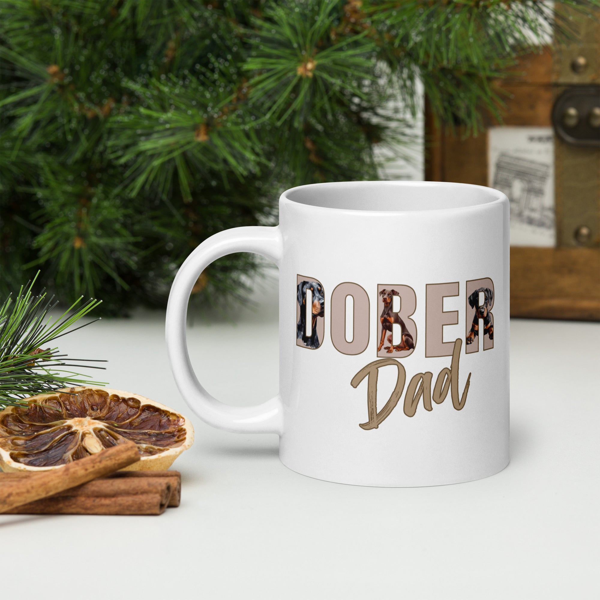 Close-up of Doberman illustrations in “Dober Dad” text on 20oz ceramic mug