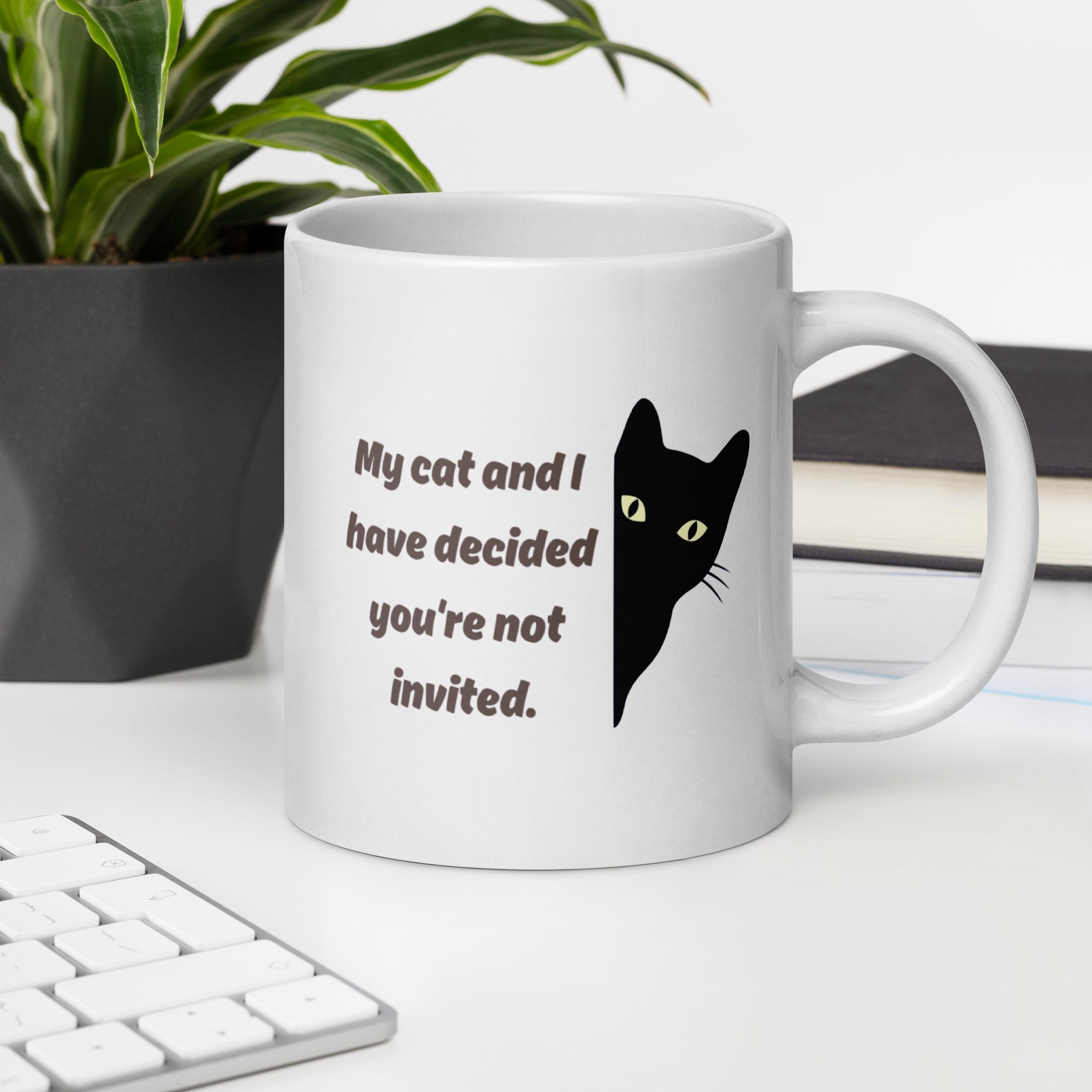 Close-up of black cat design on 20oz ceramic mug